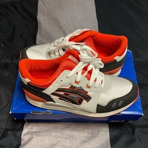 Gently worn ASICS running shoe